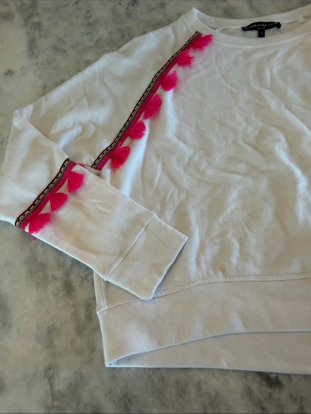 Generation Love White Crewneck Sweater with Hot Pink Tassel Trim